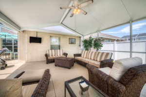 Lanai with Luxurious Patio Furniture and TV